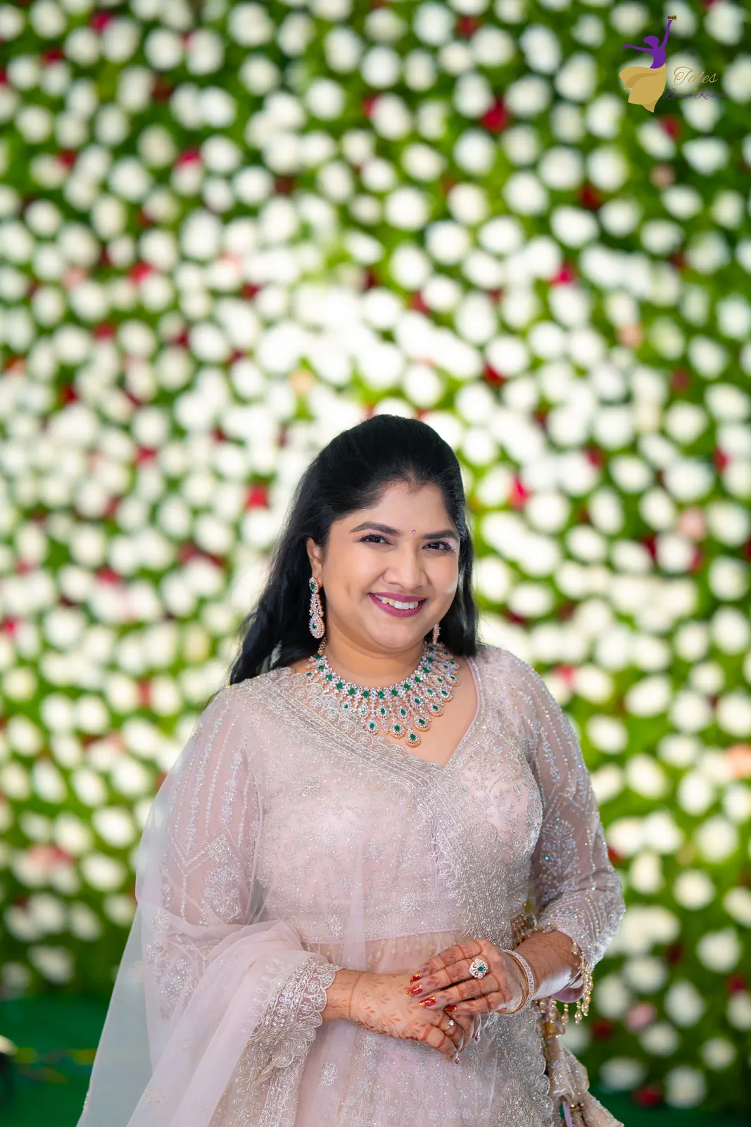 Bridal portrait of Priyanka in a blush lehenga and diamond necklace, reception