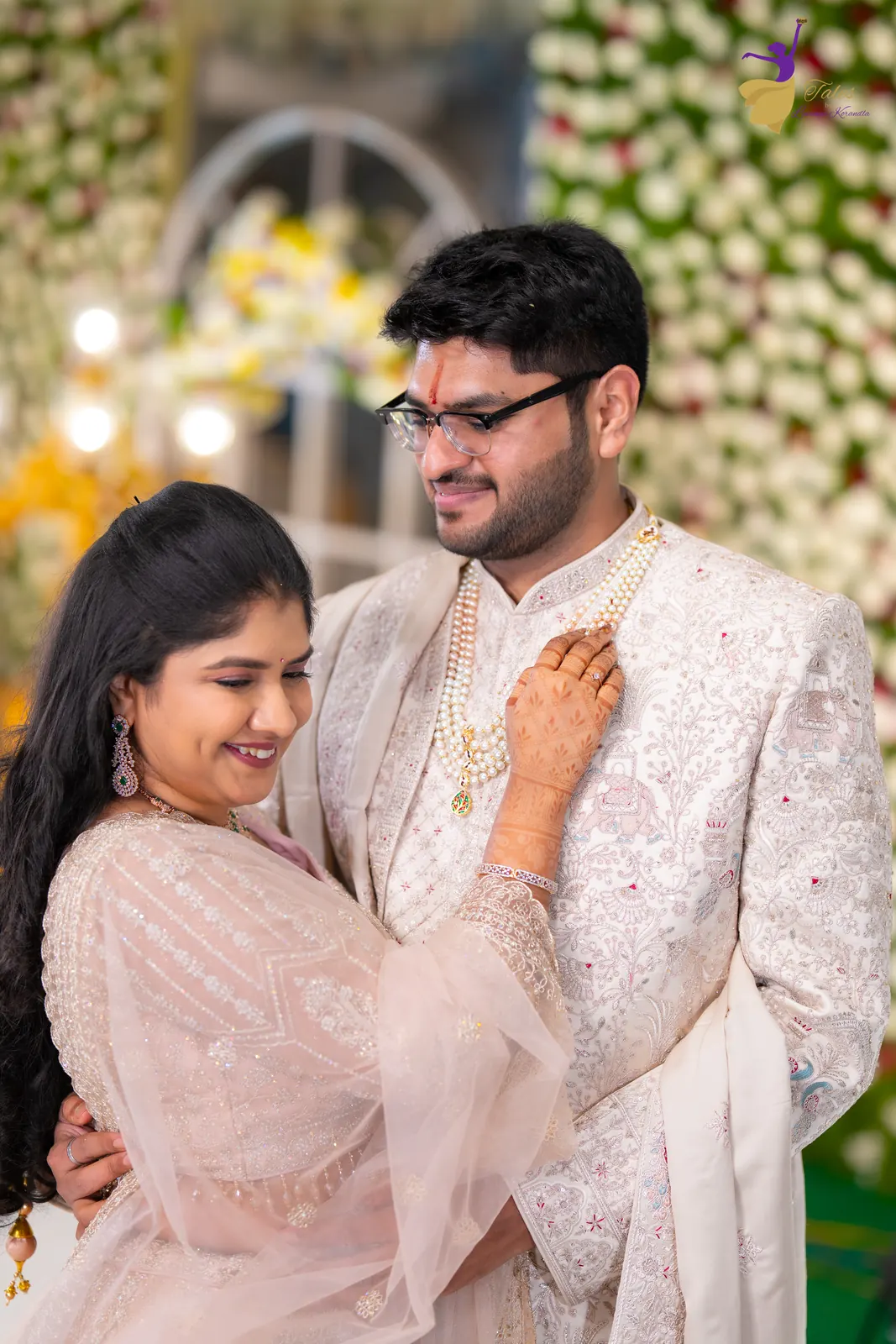 Close couple portrait of Aditya and Priyanka in warm reception lights, Hyderabad