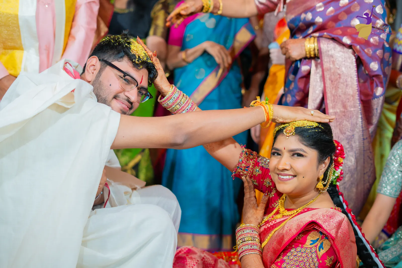 Priyanka beaming during jeelakarra bellam as Aditya’s hand rests on her head
