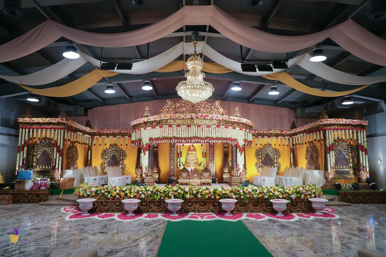 Wide view of the decorated wedding hall and mandap before the ceremony, Hyderabad