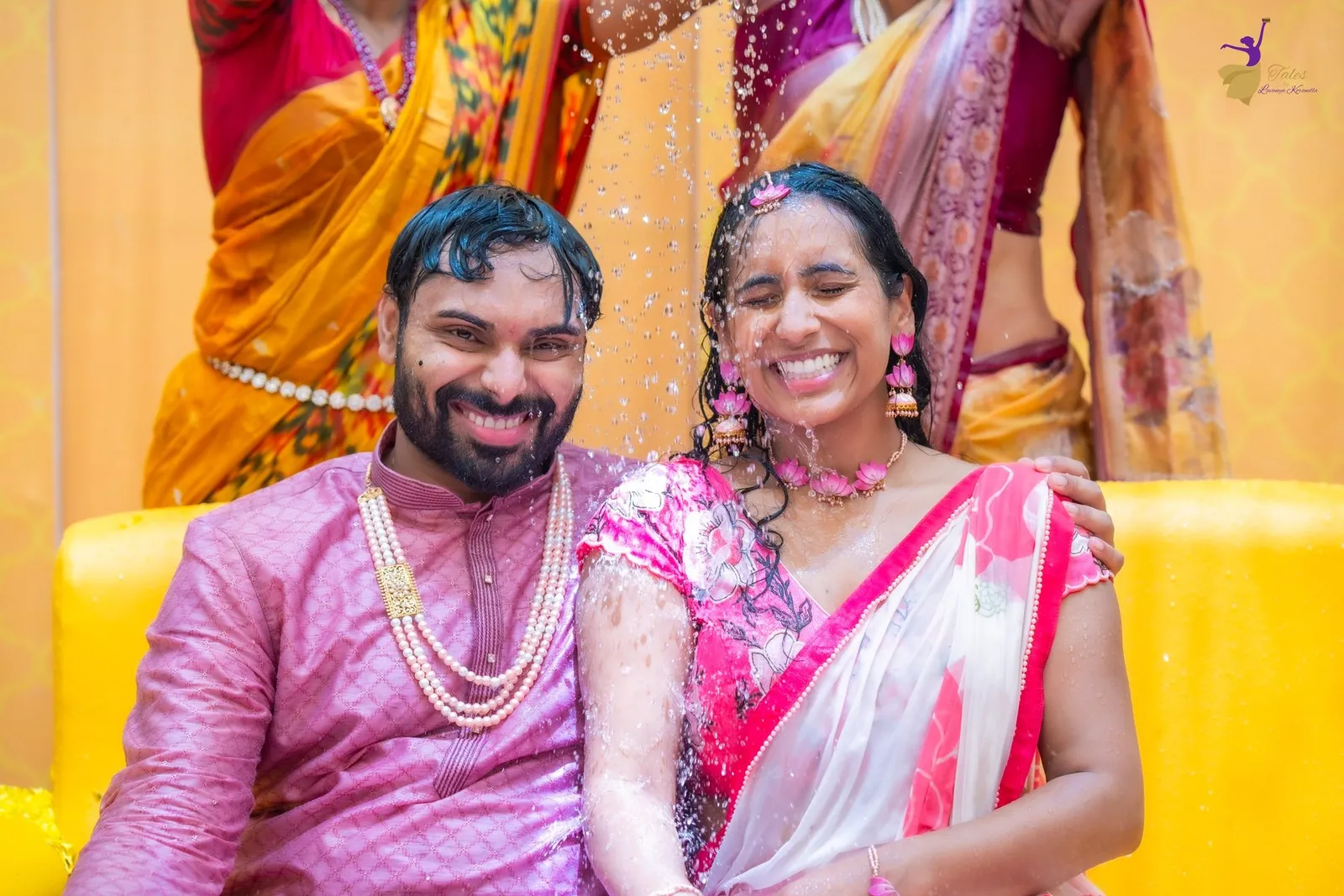 Couple laughing together at Haldi, turmeric celebration, Amalapuram