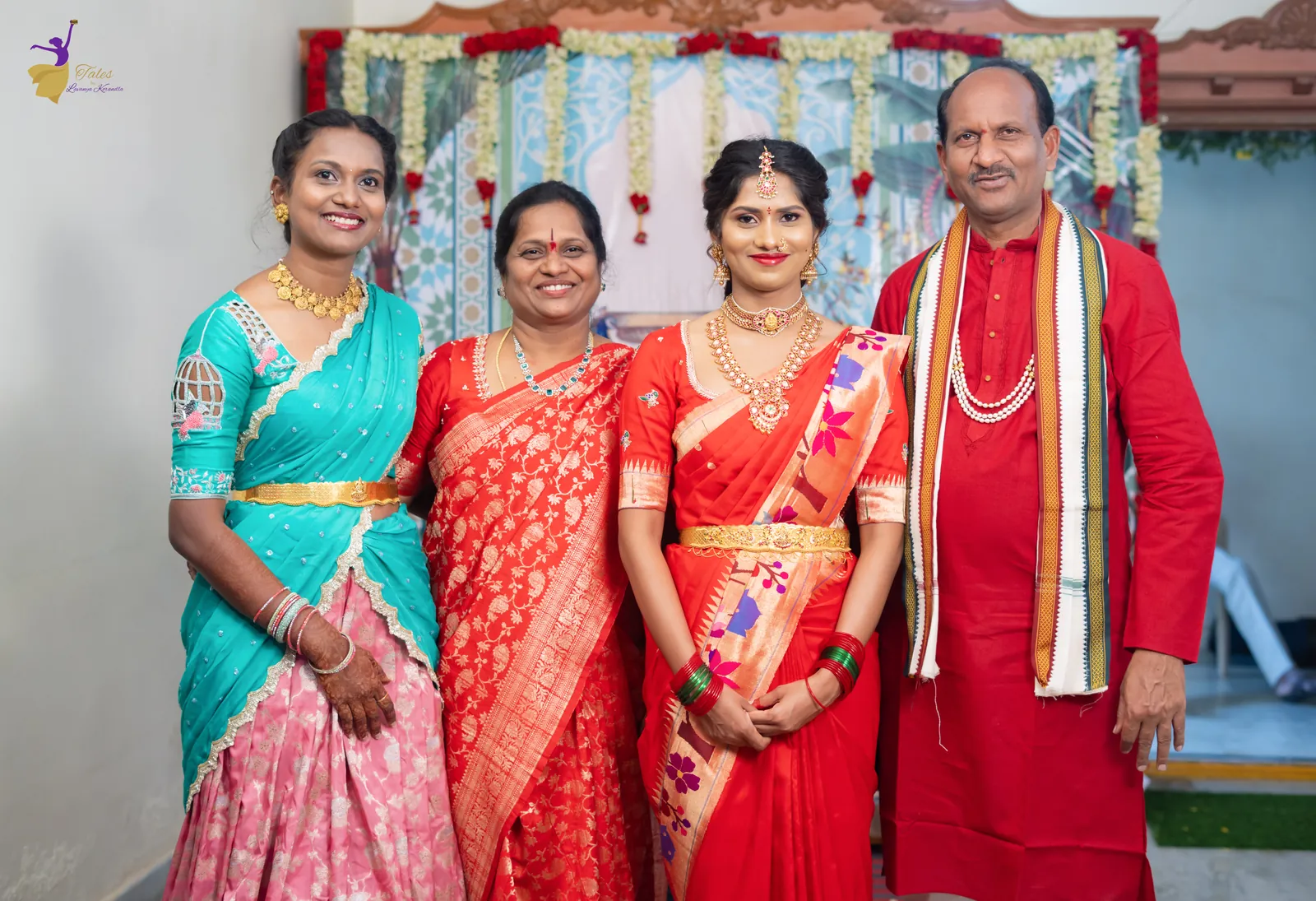 Vishwasa in red silk with her family at the Pellikuthuru