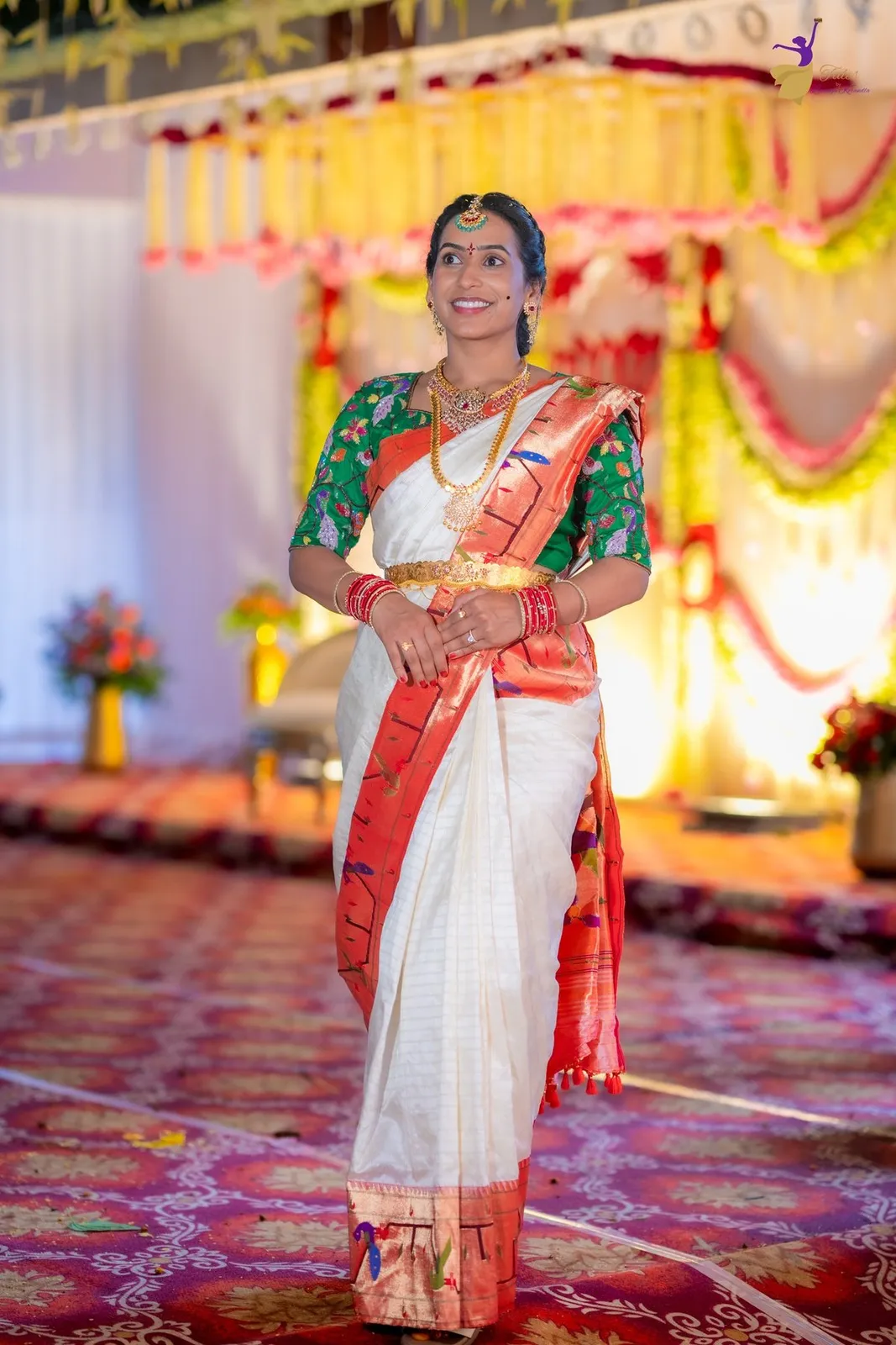 Priya full-length in white silk saree and green blouse, Pellikuthuru