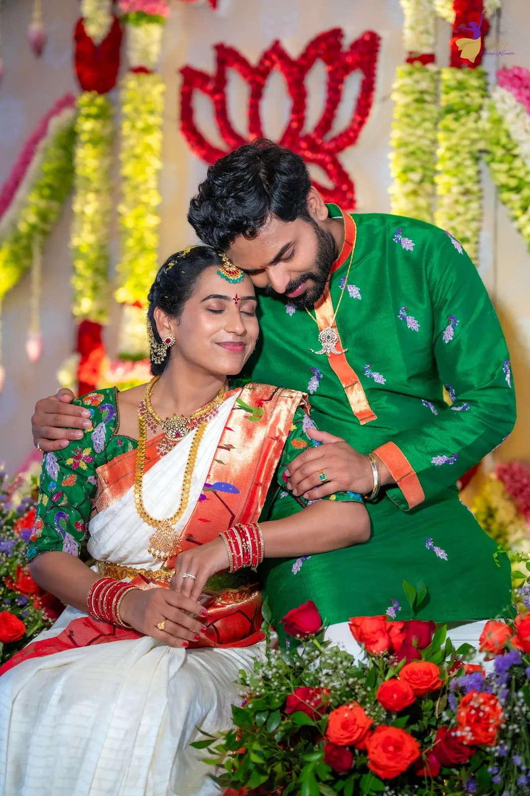 Manoj in green kurta leaning toward Priya at Pellikuthuru, Amalapuram