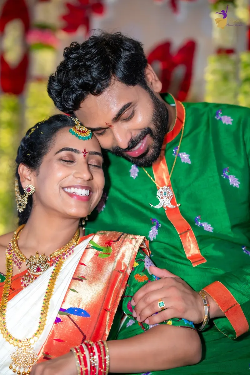 Manoj and Priya laughing forehead to forehead at Pellikuthuru, Amalapuram