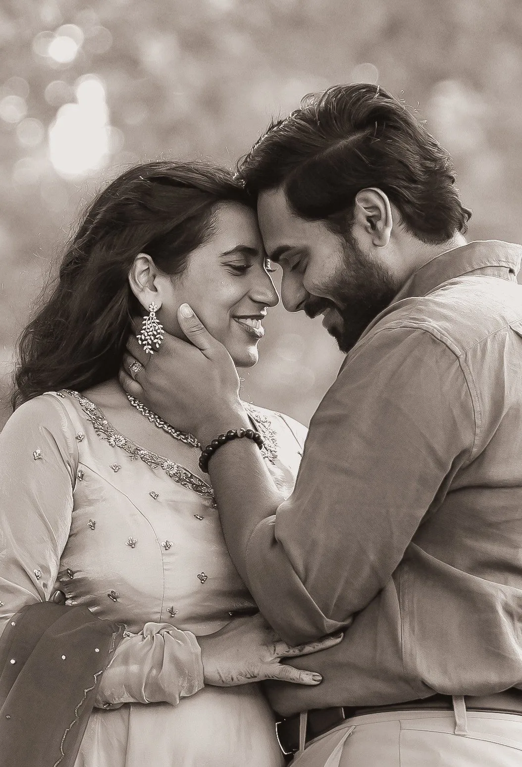 Black-and-white intimate portrait of Manoj and Priya, pre-wedding