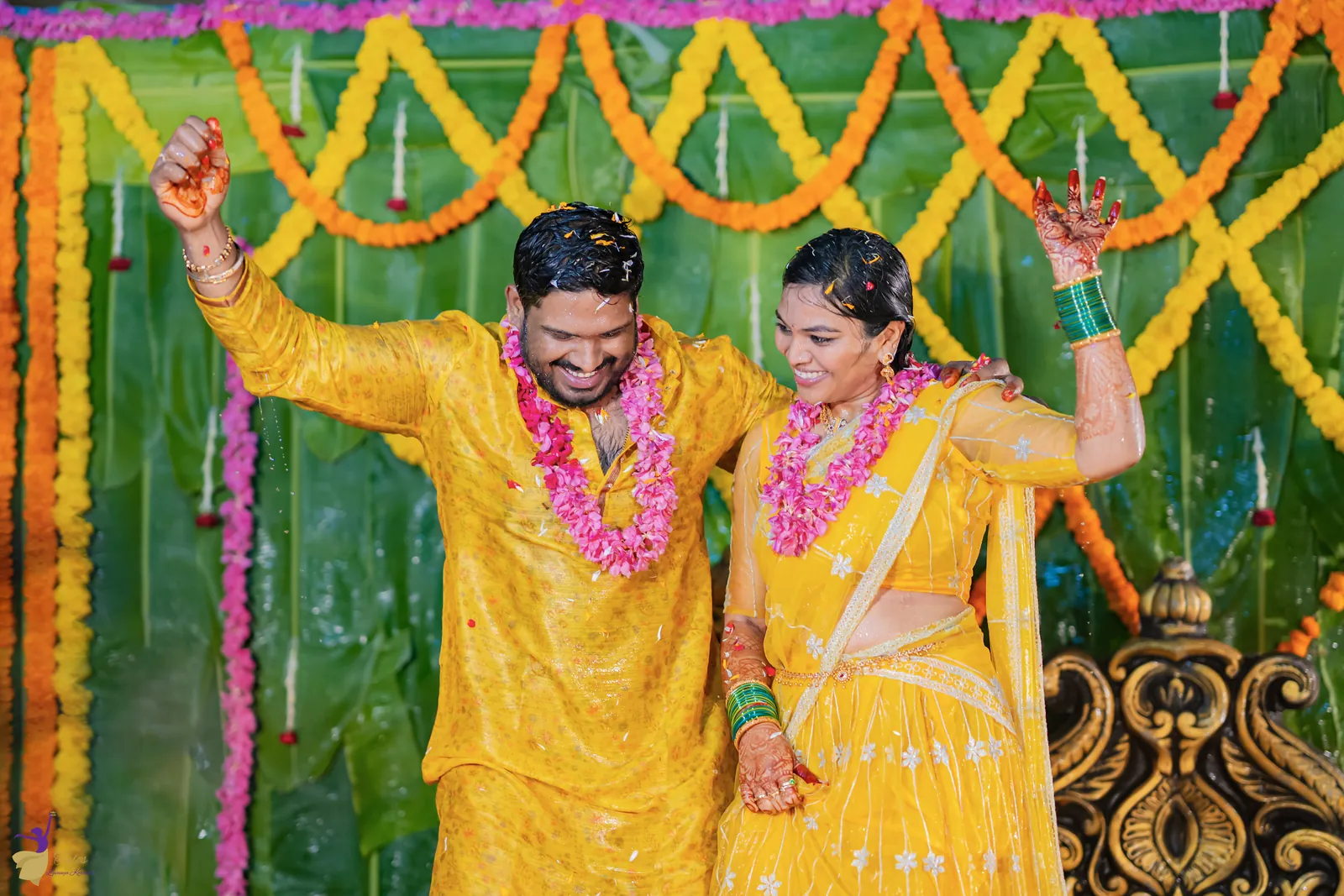 Ravinder and Anuhya dancing and laughing in yellow at their haldi, Hyderabad