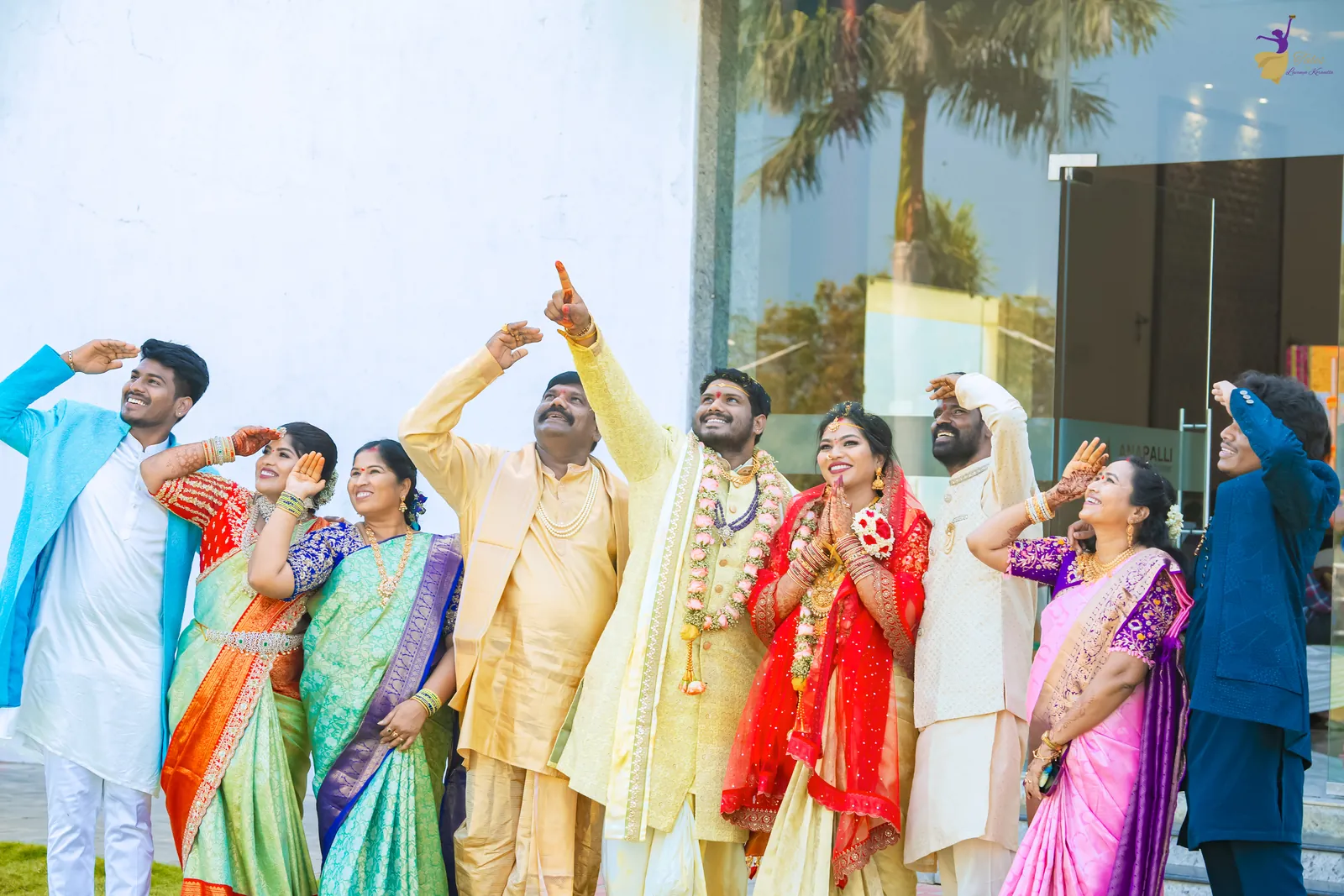 Ravinder and Anuhya striking a fun pose with their cousins outside the wedding hall