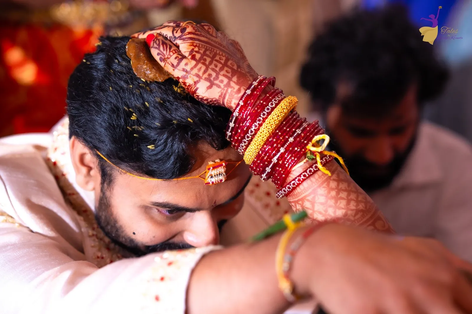 Manoj bowing his head during a Telugu wedding ritual