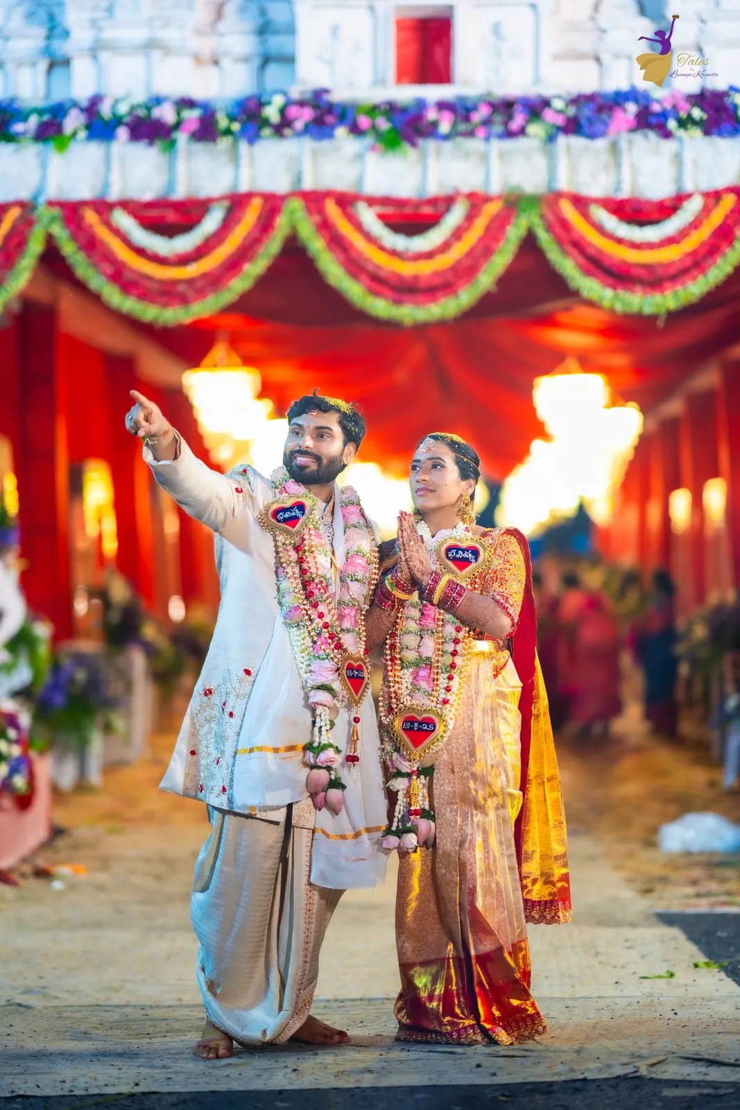Manoj and Priya standing together in wedding finery, Amalapuram