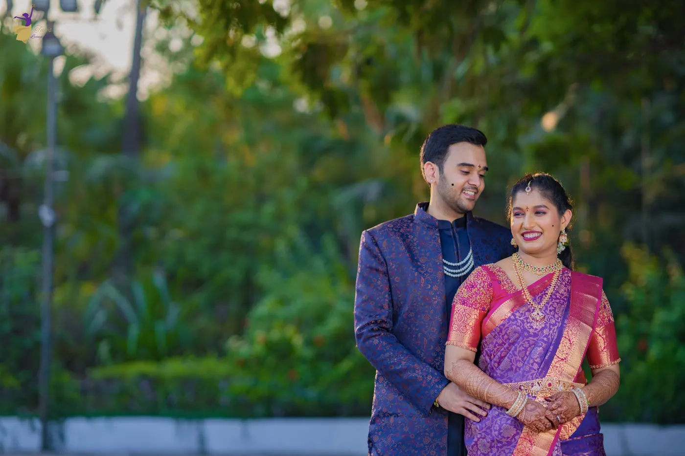 Couple in white and gold traditional wear, Hyderabad wedding