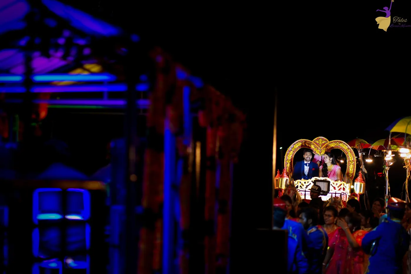 Couple celebrating under sparkling lights, Hyderabad