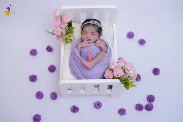Candid baby expression during a Hyderabad photoshoot